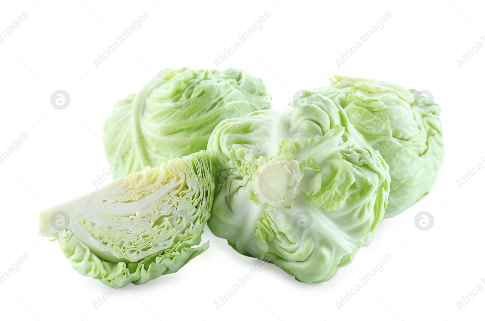 Photo of Whole and cut cabbages isolated on white