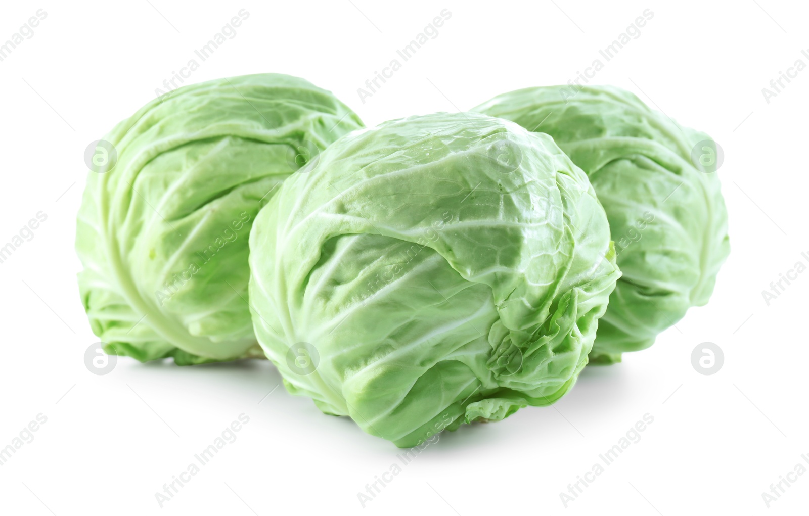 Photo of Three heads of cabbage isolated on white