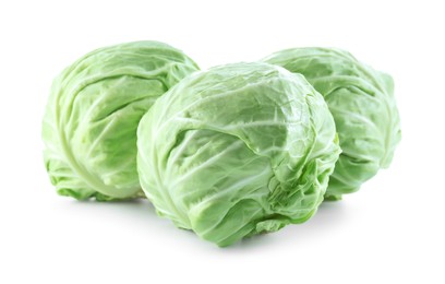 Photo of Three heads of cabbage isolated on white