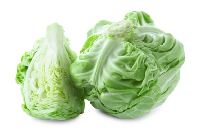 Whole and cut cabbages isolated on white