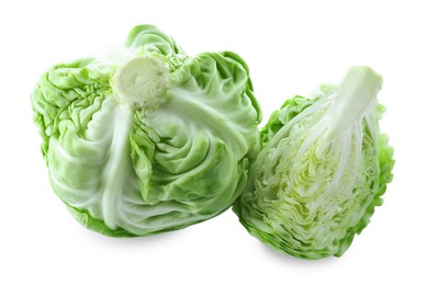 Photo of Whole and cut cabbages isolated on white