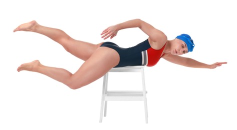 Photo of Professional sportswoman in swimsuit and cap swimming on white background