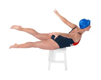 Photo of Professional sportswoman in swimsuit and cap swimming on white background