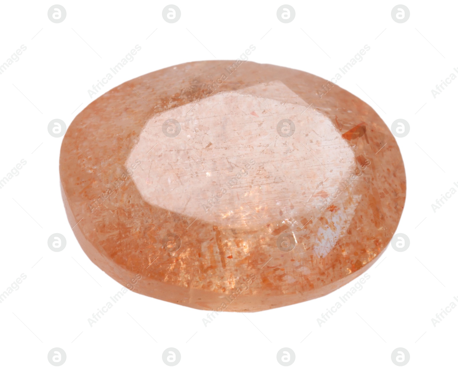 Photo of One orange shiny gemstone isolated on white