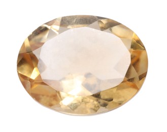 Photo of One yellow shiny gemstone isolated on white