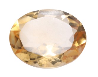 Photo of One yellow shiny gemstone isolated on white