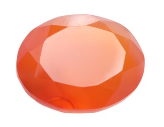 Photo of One orange shiny gemstone isolated on white