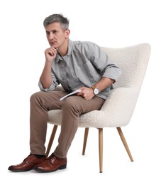 Photo of Professional psychologist with notebook sitting on chair against white background