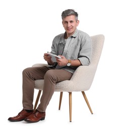 Photo of Professional psychologist with notebook sitting on chair against white background