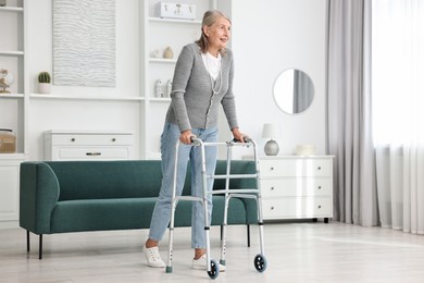 Photo of Senior woman with walking frame at home