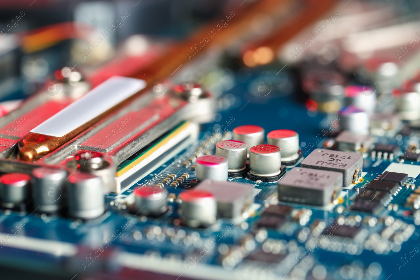 Photo of Computer motherboard as background, closeup. Electronic engineering