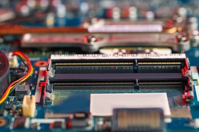 Photo of Computer motherboard as background, closeup. Electronic engineering