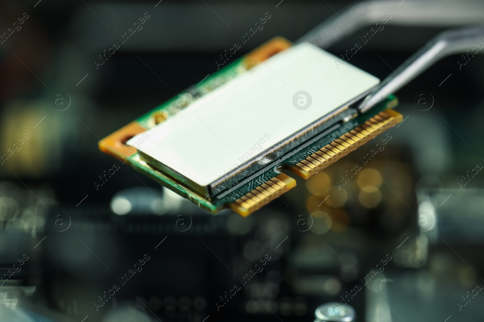 Photo of Wi-Fi card on blurred background, closeup. Electronic engineering