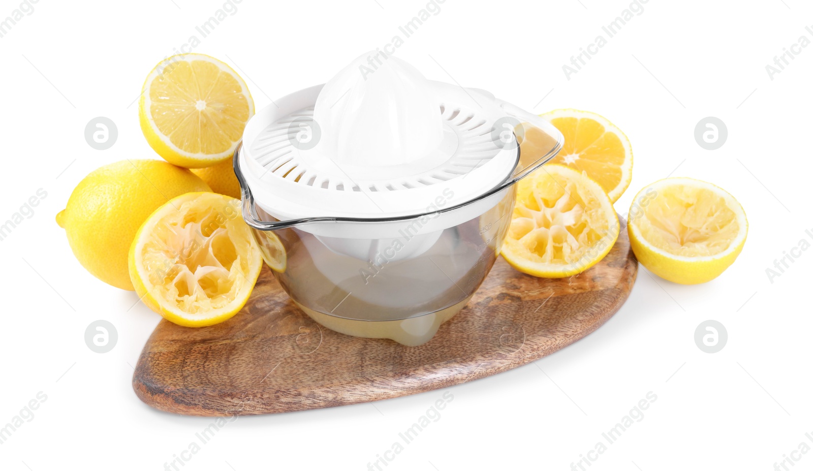 Photo of Juicer and fresh lemons isolated on white