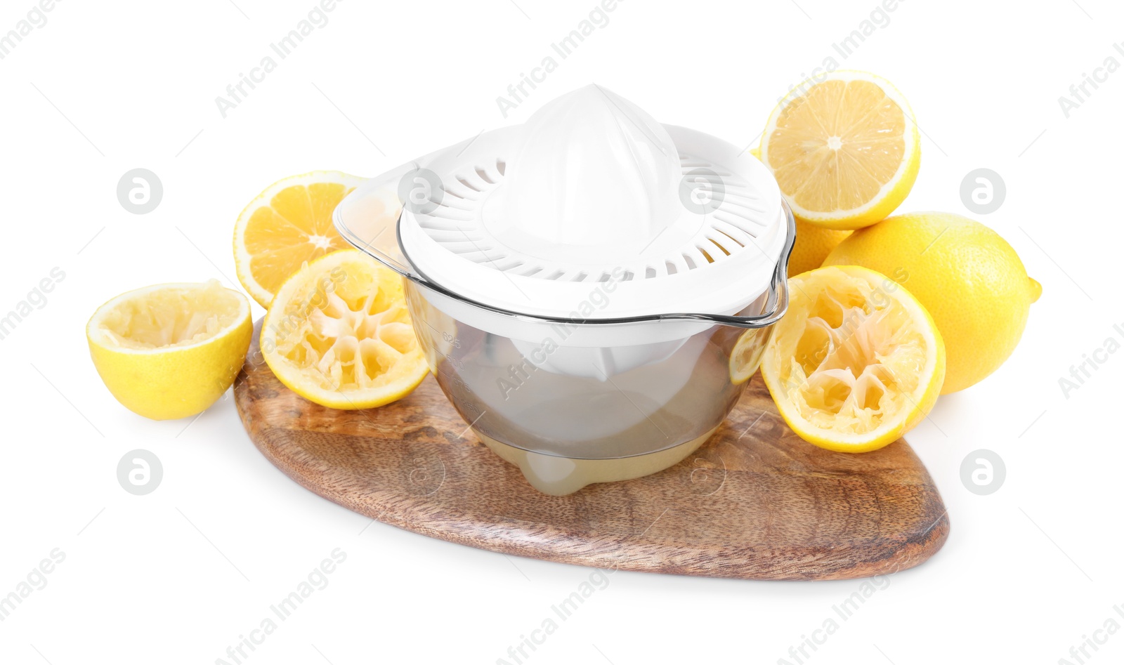 Photo of Juicer and fresh lemons isolated on white