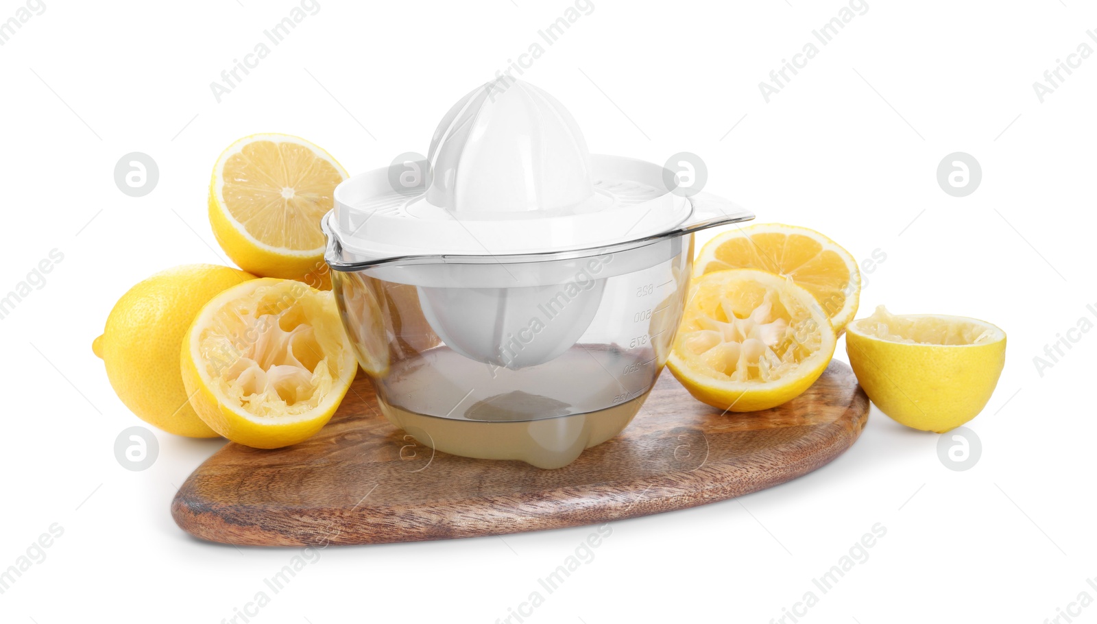 Photo of Juicer and fresh lemons isolated on white