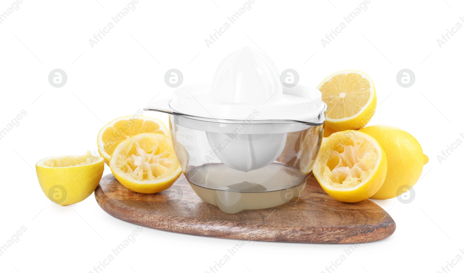 Photo of Juicer and fresh lemons isolated on white