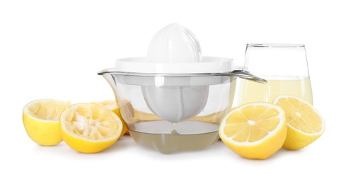 Photo of Juicer and fresh lemons isolated on white