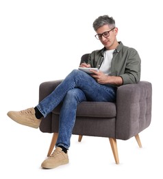 Photo of Professional psychologist with notebook sitting on chair against white background