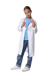 Photo of Girl with stethoscope pretending to be doctor on white background. Dreaming of future profession