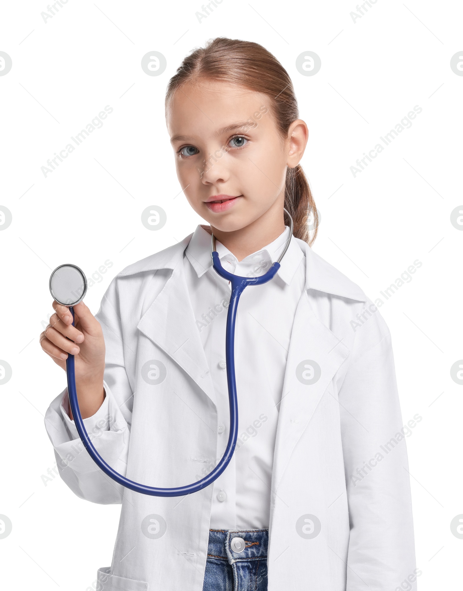 Photo of Girl with stethoscope pretending to be doctor on white background. Dreaming of future profession