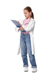 Girl with stethoscope and clipboard pretending to be doctor on white background. Dreaming of future profession