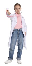 Photo of Girl with stethoscope pretending to be doctor on white background. Dreaming of future profession