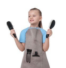 Photo of Little girl with brushes pretending to be hairdresser on white background. Dreaming of future profession