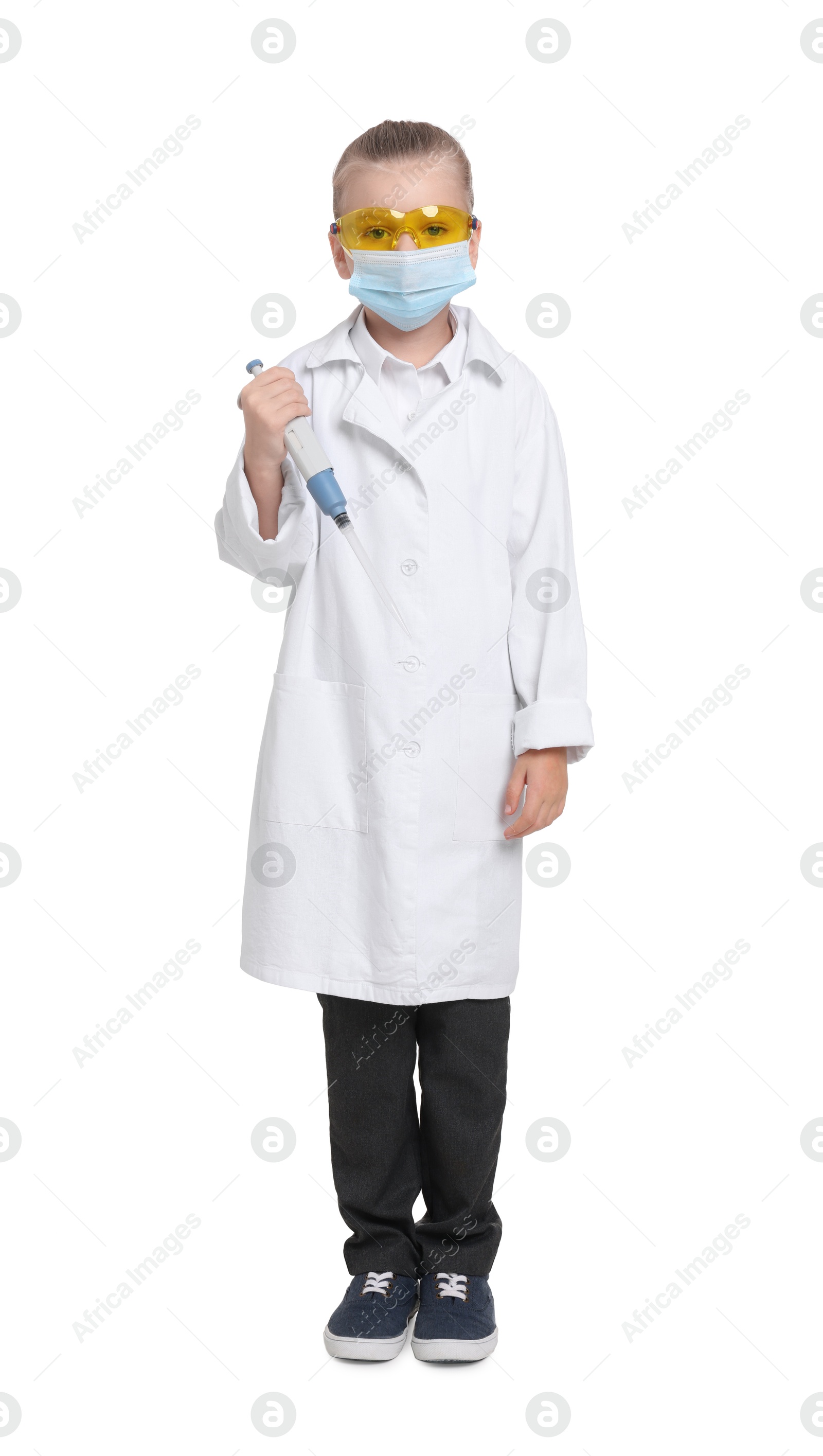 Photo of Little girl with protective mask and micropipette pretending to be doctor on white background. Dreaming of future profession