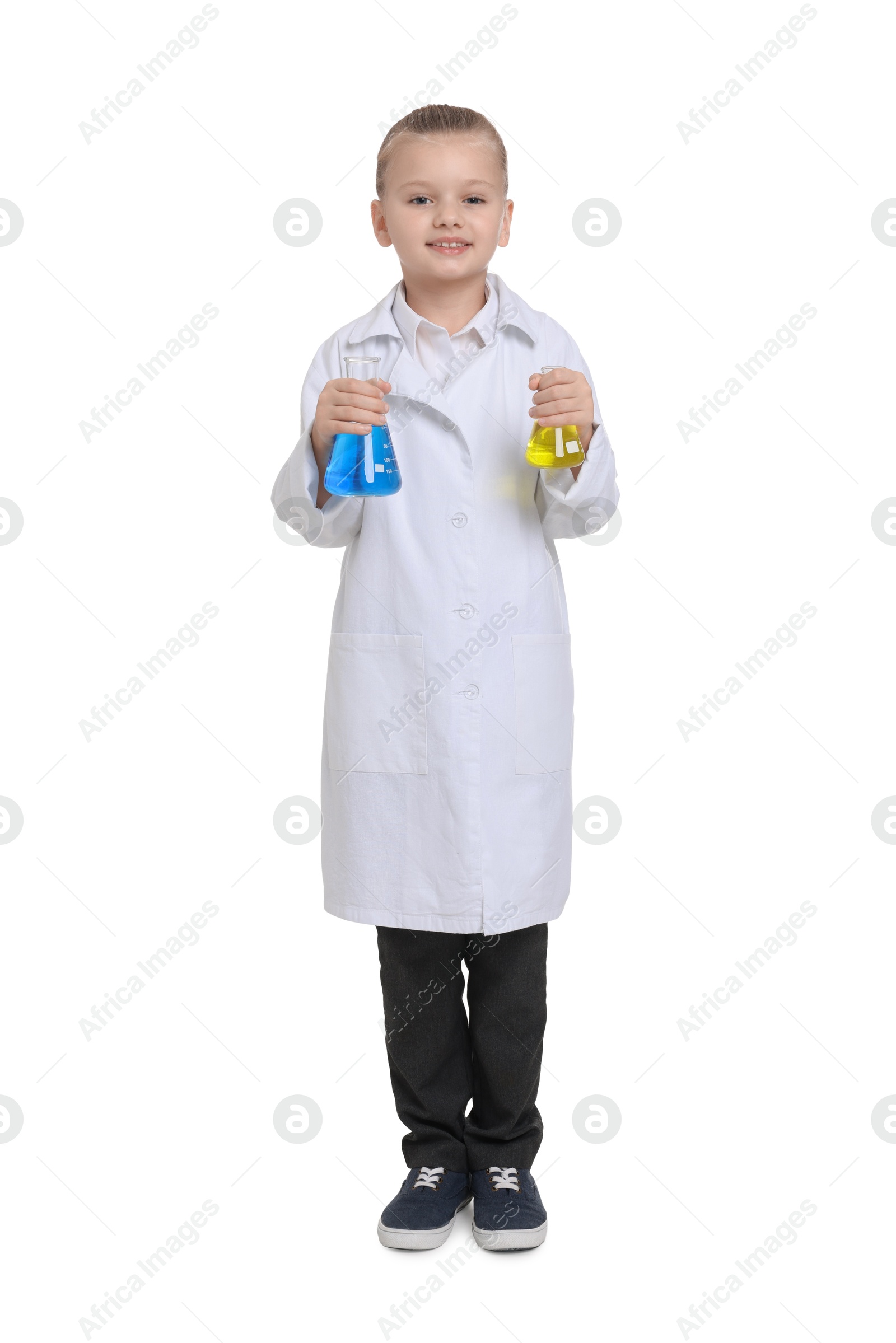 Photo of Little girl with glassware pretending to be scientist on white background. Dreaming of future profession