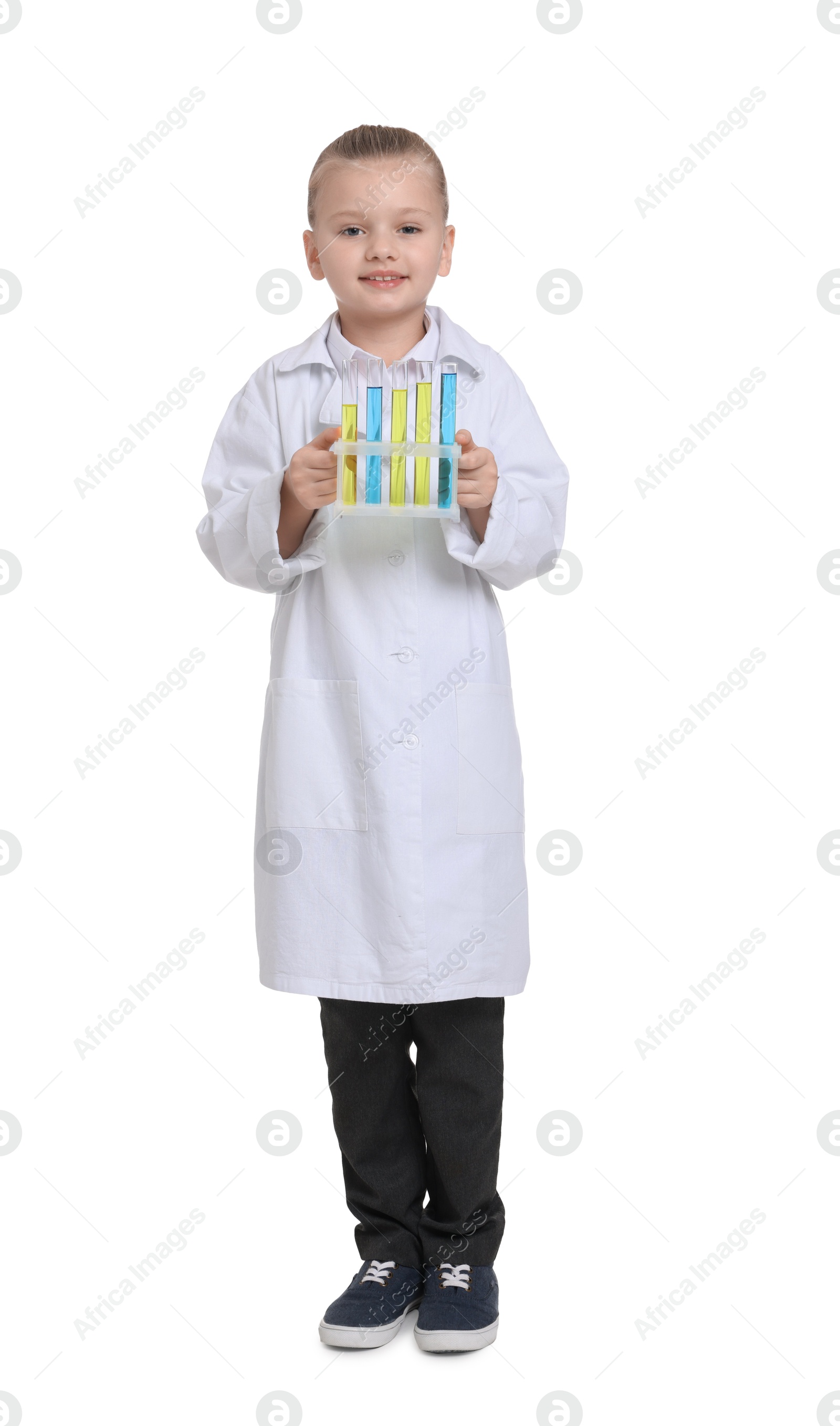 Photo of Little girl with test tubes pretending to be scientist on white background. Dreaming of future profession