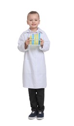 Photo of Little girl with test tubes pretending to be scientist on white background. Dreaming of future profession