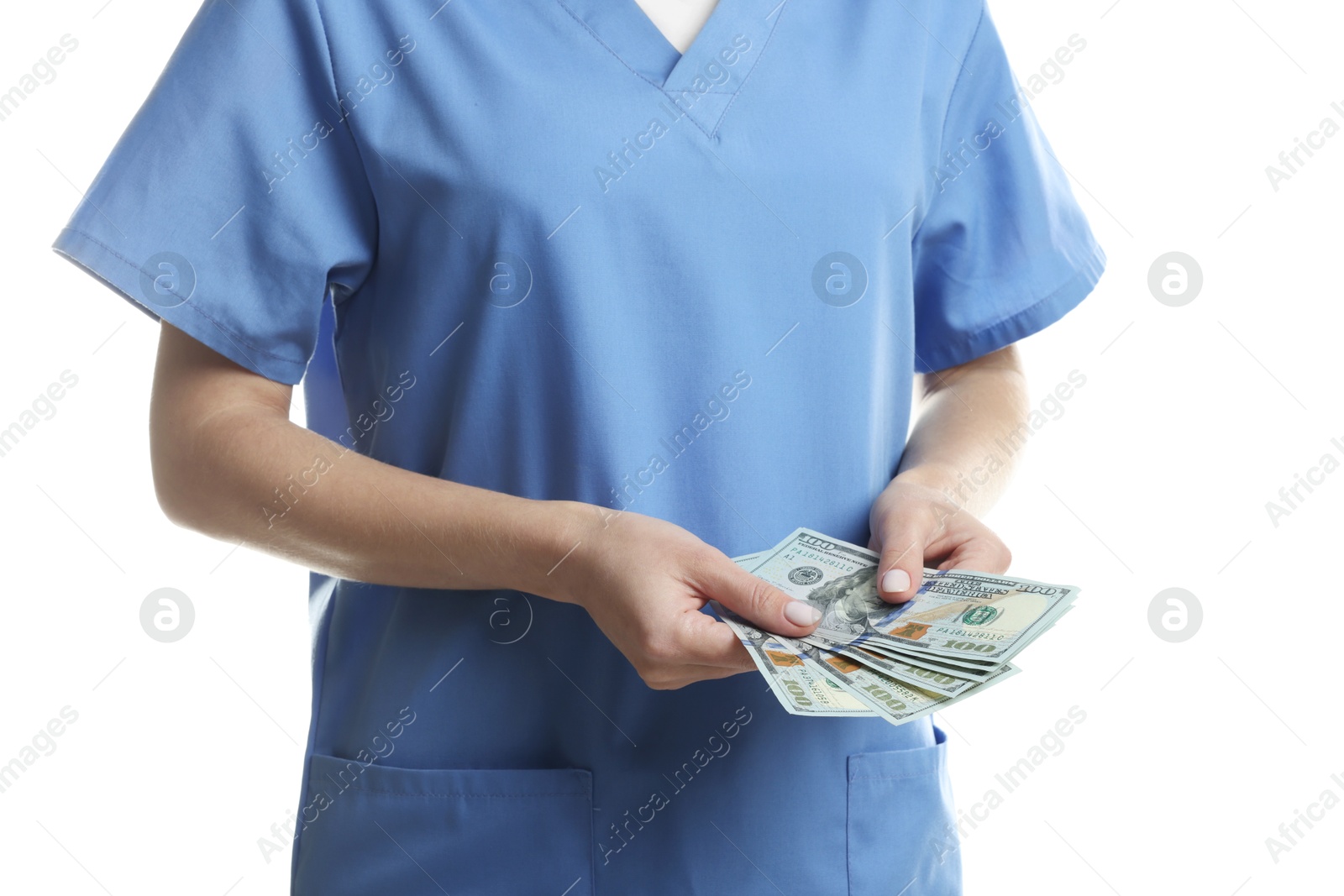 Photo of Corruption concept. Doctor with dollar banknotes on white background, closeup