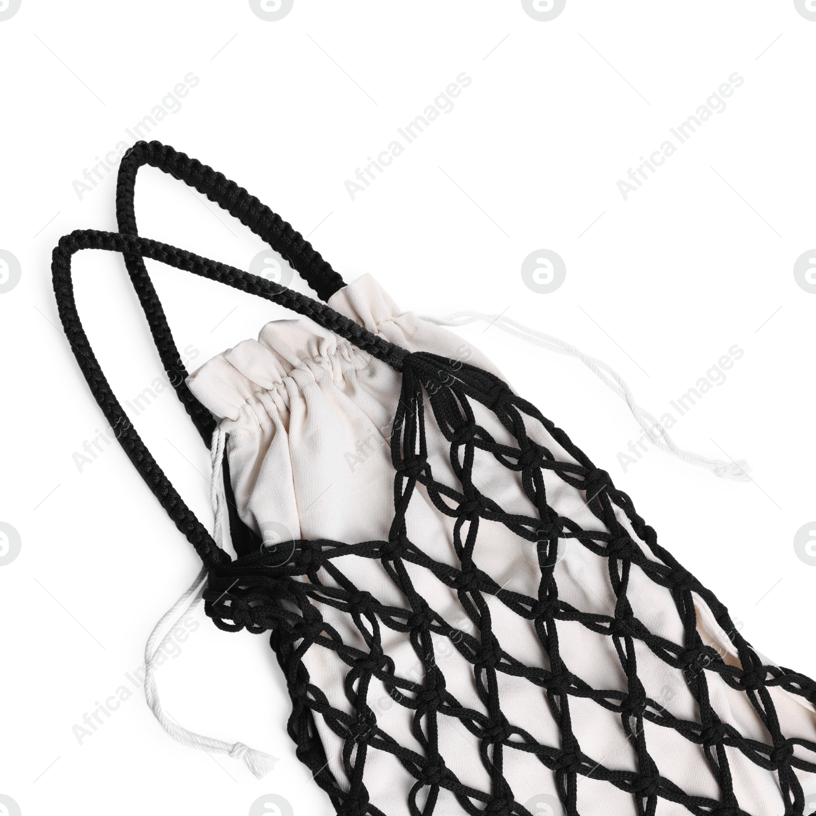 Photo of Handmade macrame shopping bag isolated on white, top view