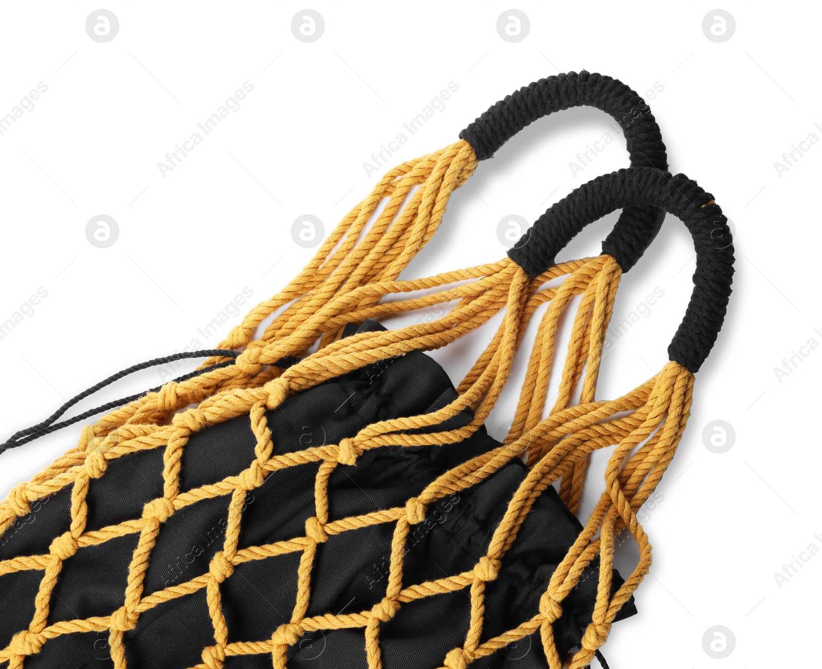 Photo of Handmade macrame shopping bag isolated on white, top view