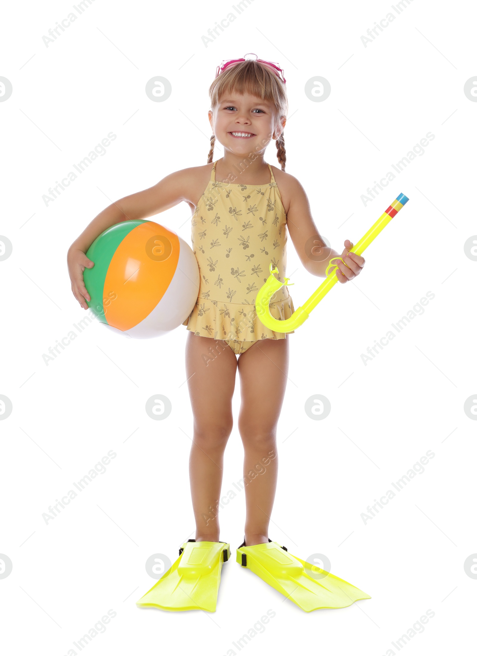 Photo of Cute little girl in swimsuit with inflatable ball and snorkeling equipment on white background