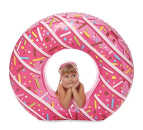 Photo of Cute little girl with inflatable ring and swim goggles on white background