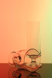 Photo of Empty glasses on table, color tone effect