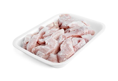 Photo of Frozen pieces of chicken fillet in container isolated on white