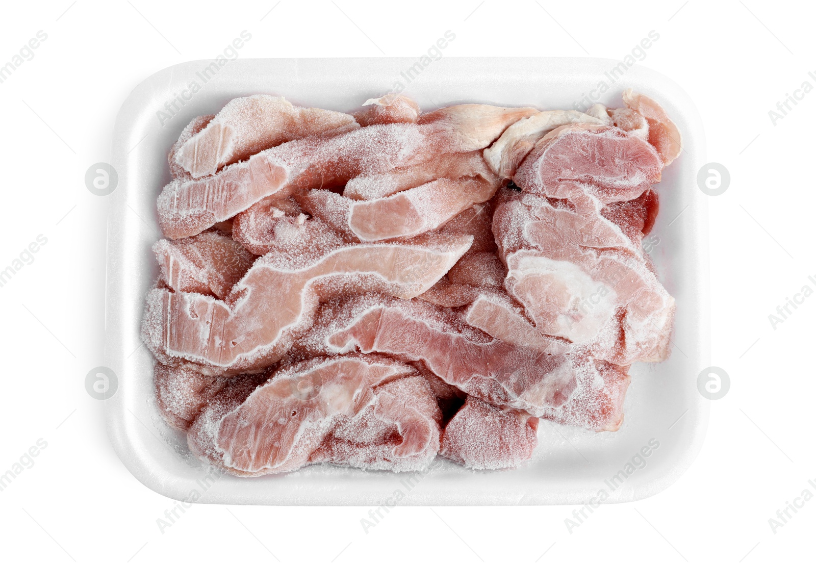 Photo of Frozen pieces of chicken fillet in container isolated on white, top view