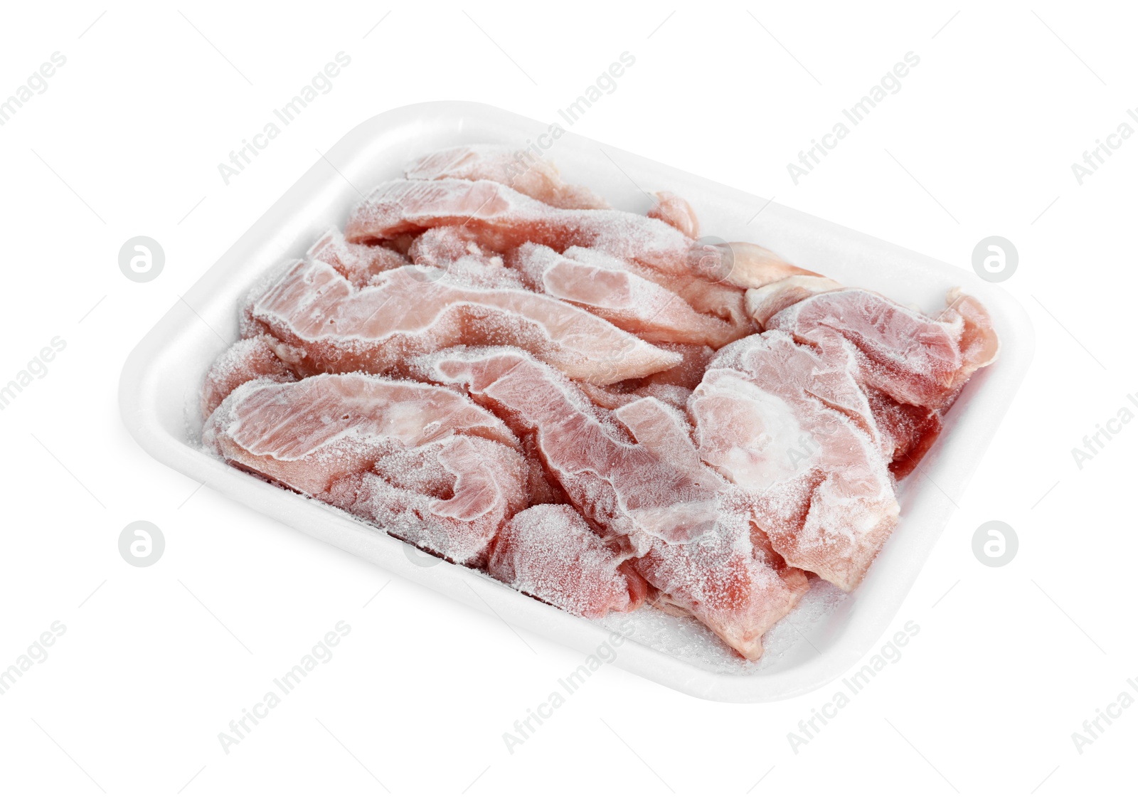 Photo of Frozen pieces of chicken fillet in container isolated on white