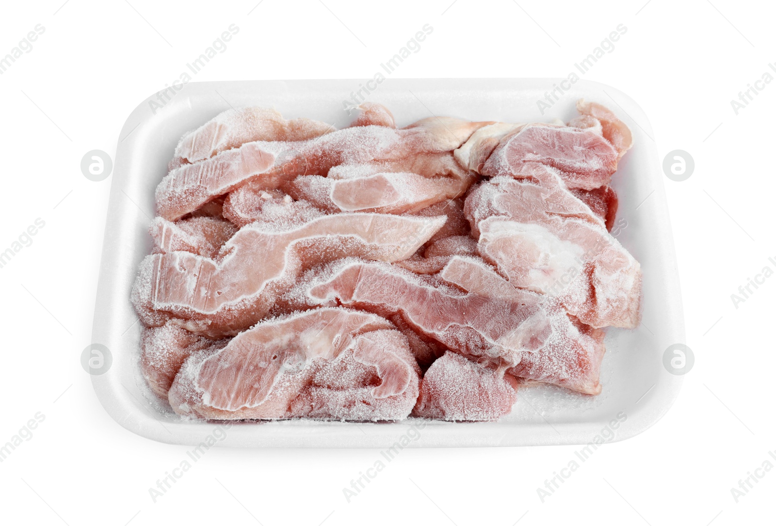 Photo of Frozen pieces of chicken fillet in container isolated on white