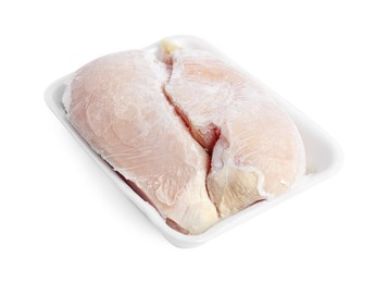 Photo of Frozen chicken breasts in container isolated on white