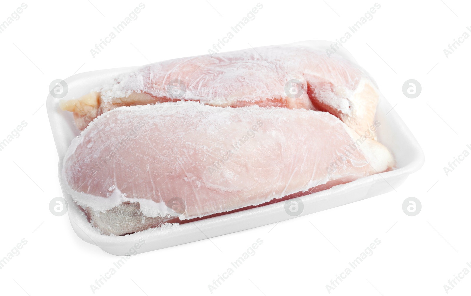 Photo of Frozen chicken breasts in container isolated on white