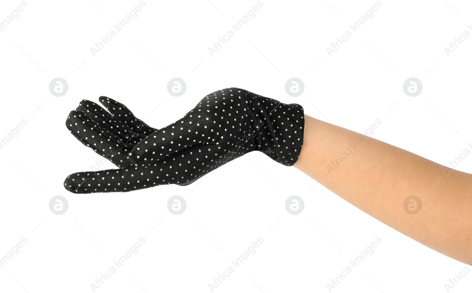 Photo of Woman in elegant polka dot glove isolated on white, closeup