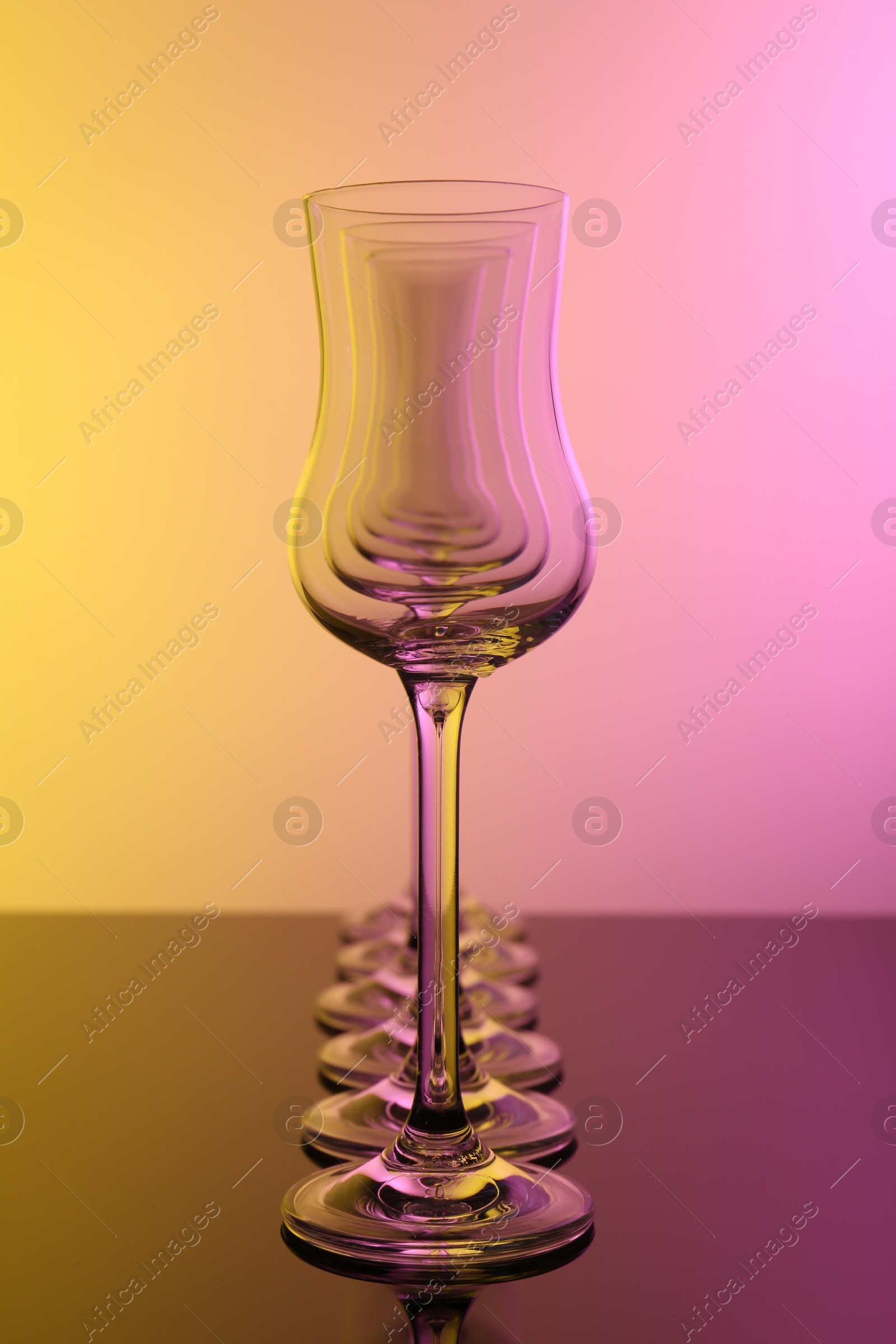 Photo of Empty glasses on table, color tone effect