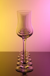 Photo of Empty glasses on table, color tone effect