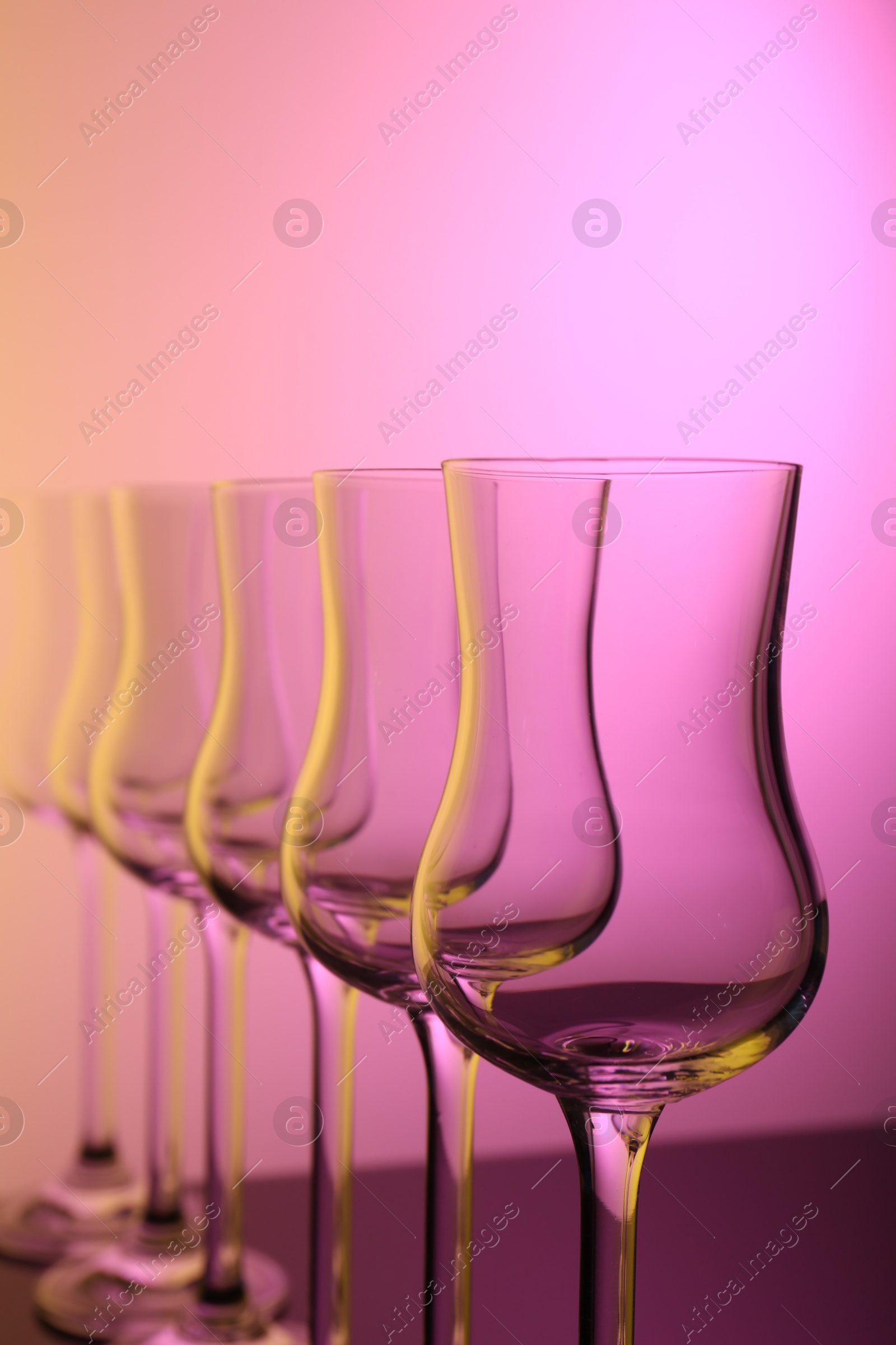 Photo of Empty glasses on table, color tone effect