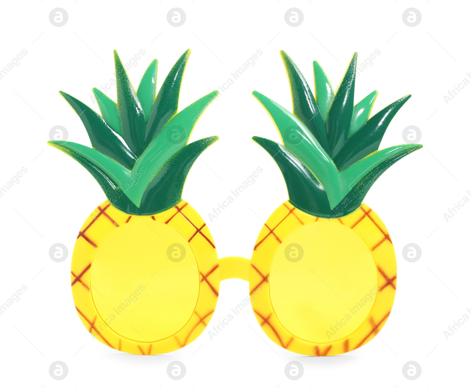 Photo of Creative pineapple shaped sunglasses isolated on white