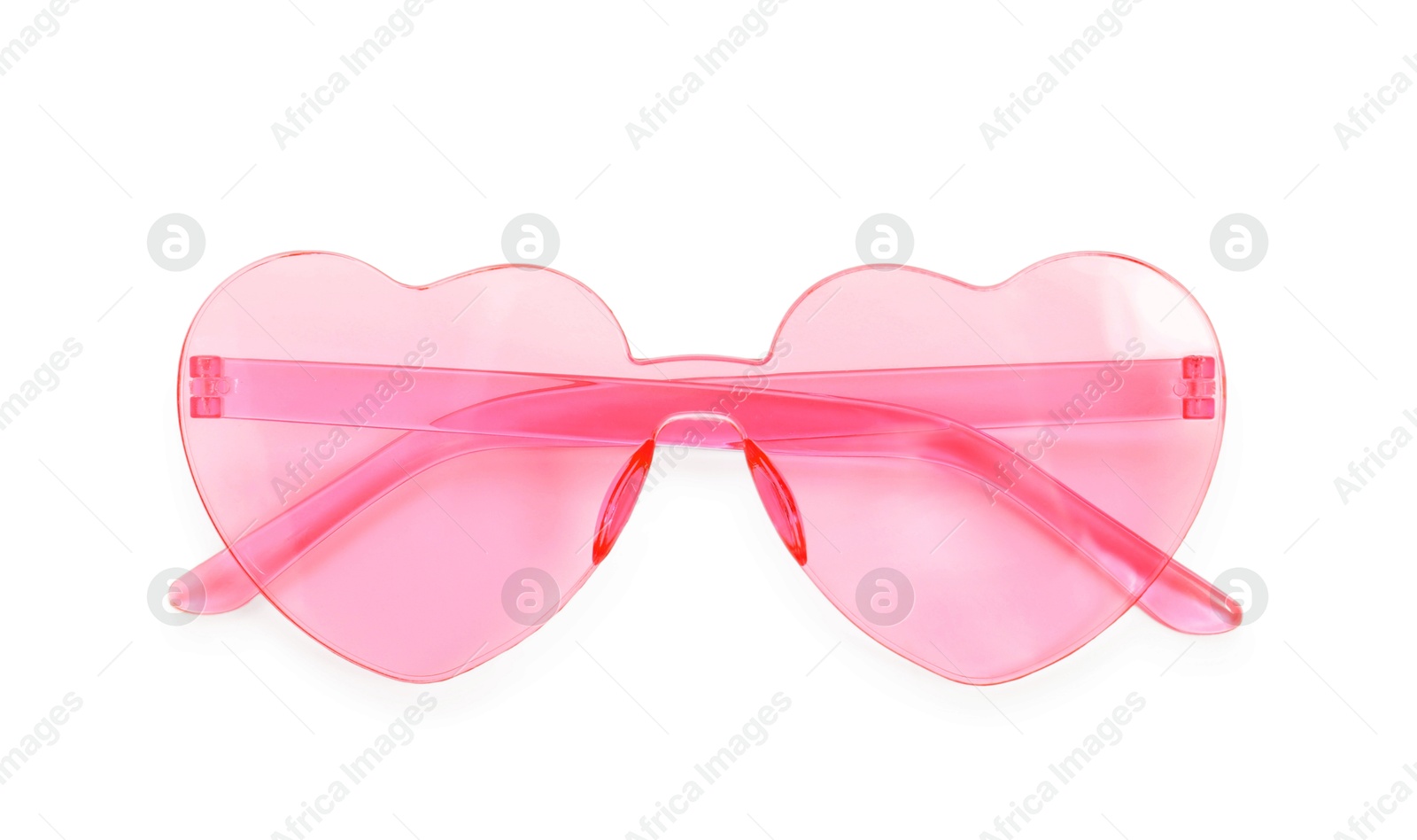 Photo of Stylish heart shaped sunglasses isolated on white